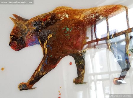 resin walking cat close up